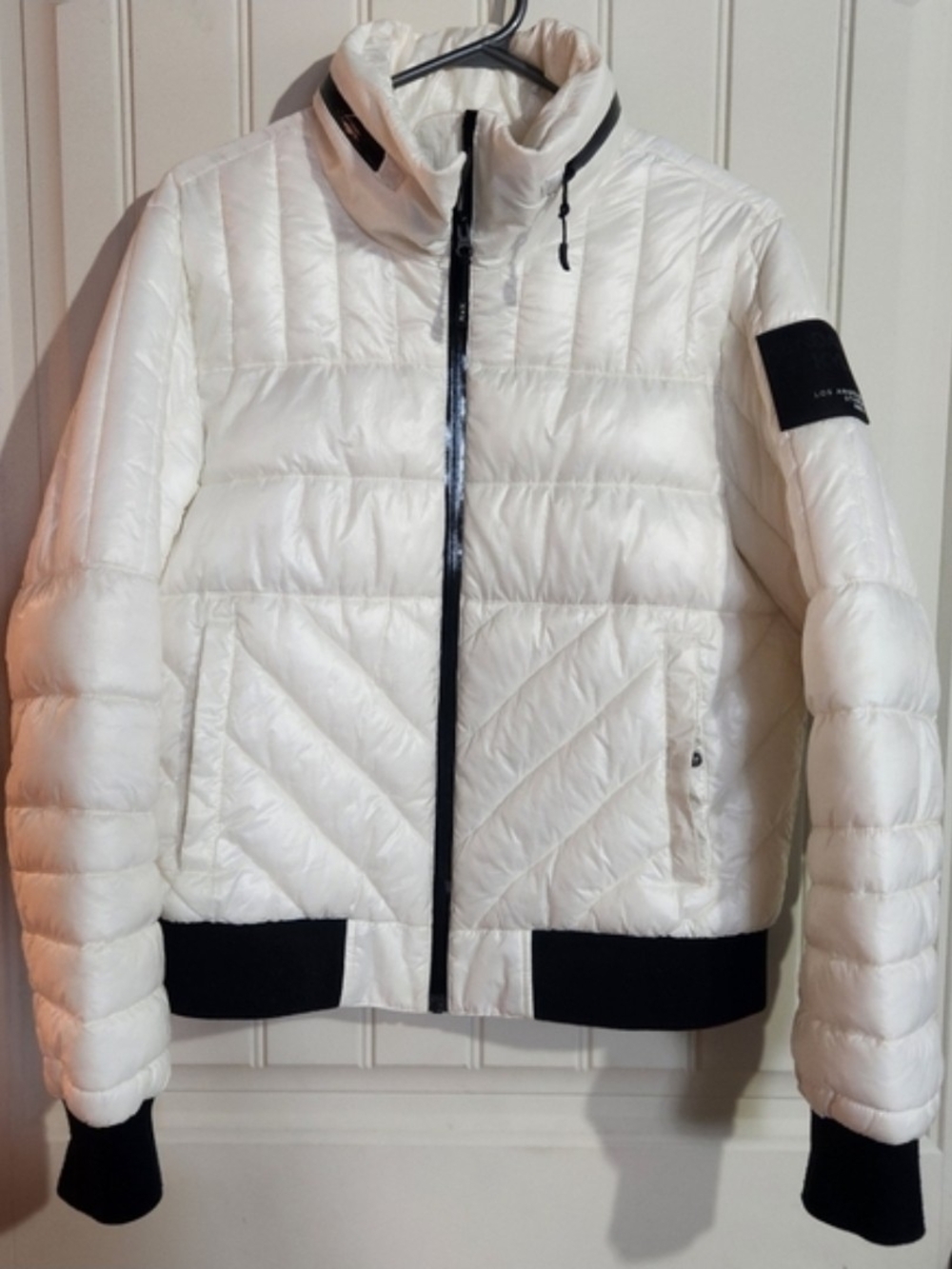 Kendall & Kylie White Quilted Puffer Jacket with Black Trim.